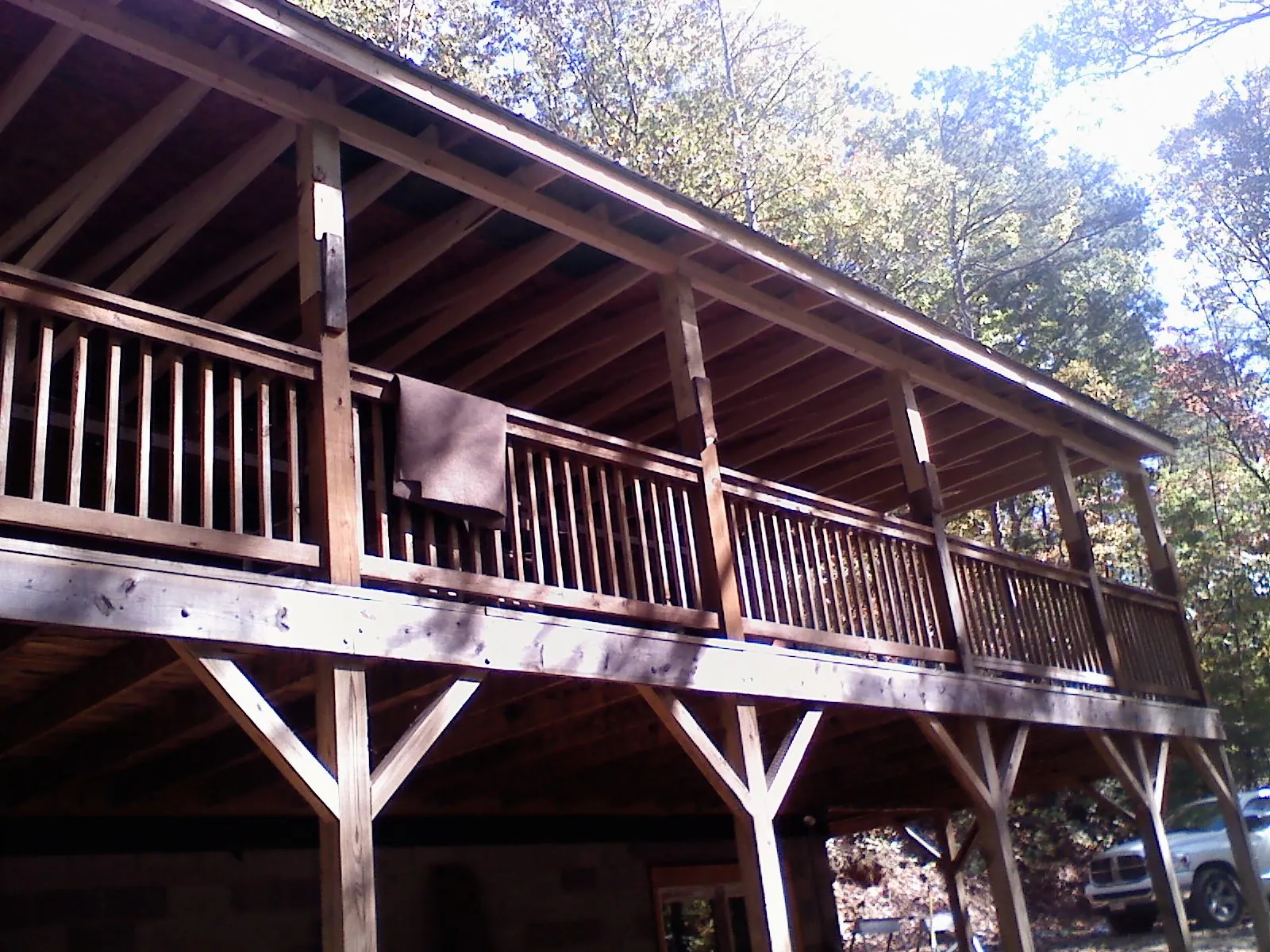 Timber framing under a new elevated porch and deck — Roof Leak Repair in Icard by Roofing Brothers
